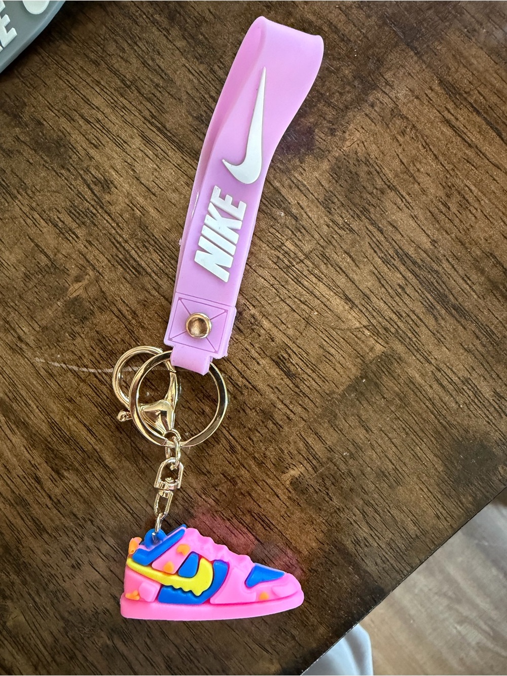Nike Pink Silicone Wrist Keychain with Multicolor Sneaker Charm